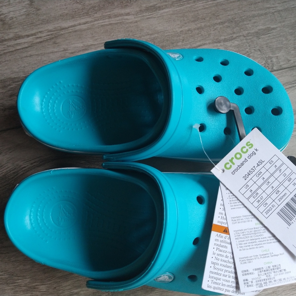 New Crocs size J 4